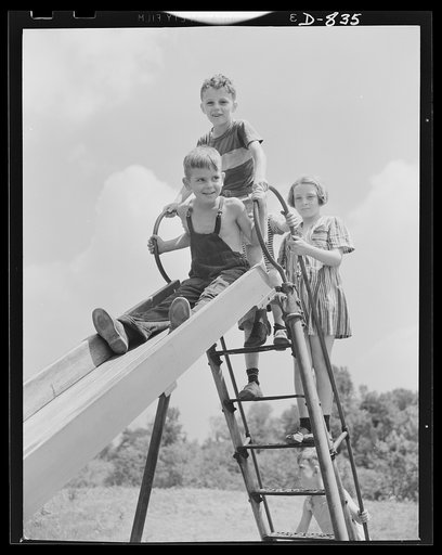 Defense housing, Erie, Pennsylvania. A large playground with slides and swings is provided for children of the defense trailer camp. Proceeds from candy and cigarette vending machines located in the central utility buildings maintain the playground