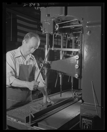 Defense housing, Erie, Pennsylvania. B.J. Rogan, thirty-three, is employed as a drill press operator at the General Electric plant in Erie, Pennsylvania. Working strictly from sectional blueprints, he seldom knows if the fittings he makes will be used for submarines, minesweepers, or gun mounts