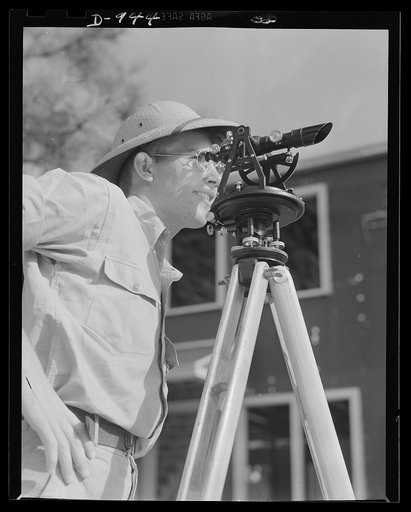 Defense housing. Ben Morrell Project, Norfolk, Virginia. A surveyor on the Ben Morrell Project near Norfolk, Virginia. The homes being built here by the Navy under the coordinated Defense Housing Program are for both married enlisted and civilian personnel employed at the Norfolk naval base. The pro