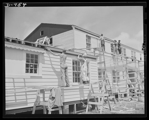 War housing. Langley Field, Newport News, Virginia. Multi-unit apartments for housing married, enlisted personnel at the Army Air base. Construction work on one of the 350 units being built by the Public Buildings Administration under a war authority program at a cost of $1,282,000. The project is o