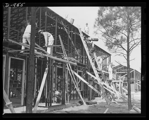 Defense housing. Ben Morrell Project, Norfolk, Virginia. Construction of the steel frame units. This project is being built by the Navy at a cost of $3,356,000 to house married enlisted personnel and civilians employed at the Norfolk naval base. Of the 1,362 units, 1,062 were completed by June 1, 19