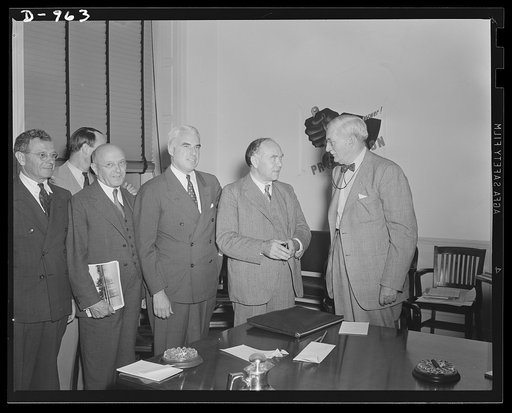 Lord Beaverbrook discusses British military and civilian needs with representatives of the Office of Production Management in Washington, D.C. August 19, 1941. Left to right: Sidney Hillman, Associate Director, OPM; John Lord O'Brian, General Counsel, OPM; Edward R. Stettinius, Jr. Director of Prior