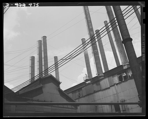 Steel alloy manufacture. Allegheny Ludlum Steel Corporation, Brackenridge, Pennsylvania. Power for the wheels of defense industry. The throbbing heart of this plant where scrap iron and steel are convert into alloy steels for the national defense production program. Heavy wires carry current to the 