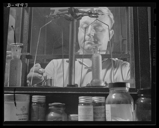 Steel alloy manufacture. Allegheny Ludlum Steel Corporation, Brackenridge, Pennsylvania. Quality in the manufacture of steel requires constant control and research. This chemist is weighing the elements of a steel alloy to determine its exact composition. Analysis is determined to 1/1000 of 1 percen
