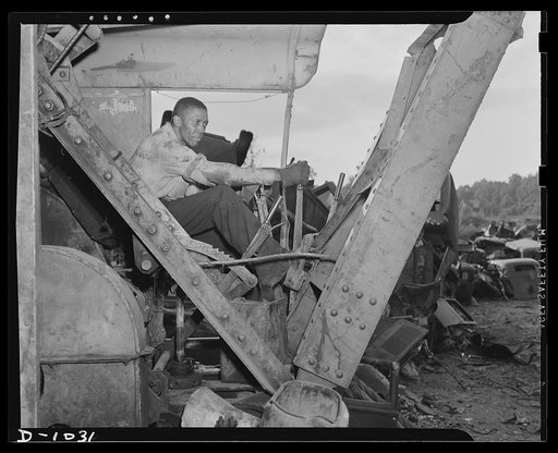 Conservation. Scrap iron and steel. It takes steel to make steel, even in the handling of scrap to feed the furnaces of the steel industry which is turning out increasing quantities of this vital defense material. This man operates a huge crane in a Baltimore, Maryland scrap dealer's yards. Such cra