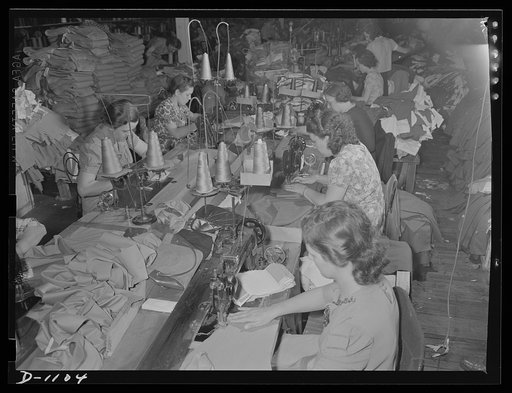 Army uniform trouser manufacture. Kane Manufacturing Company, Louisville, Kentucky. 1300 trousers a day for National Defense. Sewing operations on some of these may trousers. Especially strong thread is specified in the rigid requirements issued by the Quartermaster Corps to stand the rough wear the