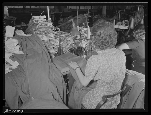 Army uniform trouser manufacture. Kane Manufacturing Company, Louisville, Kentucky. 1300 trousers a day for National Defense. Sewing operations on some of these may trousers. Especially strong thread is specified in the rigid requirements issued by the Quartermaster Corps to stand the rough wear the