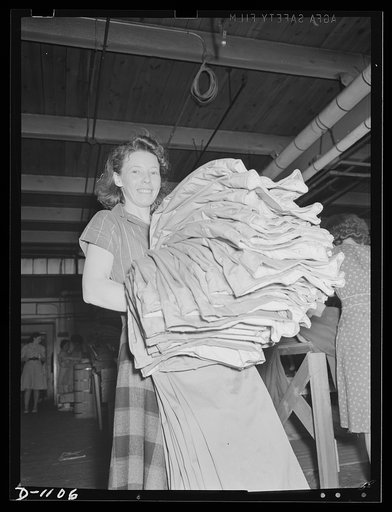 Army uniform trouser manufacture. Miss Lillie Page, worker at the Kane Manufacturing Company, Louisville, Kentucky. 1300 pair of trousers a day are turned out in this plant to clothe our expanding Army