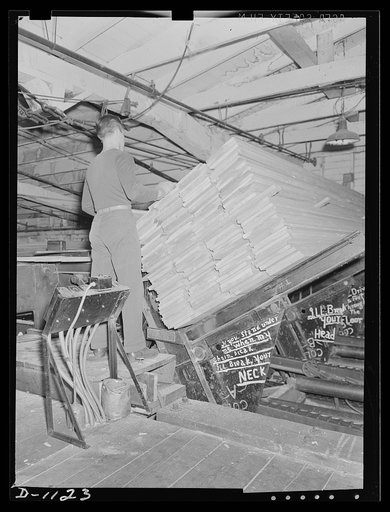 Lumber manufacture. Boise Payette Lumber Company, Boise, Idaho. Semi-finished boards on the automatic unloader which feeds then into the automatic planner for the finished operation