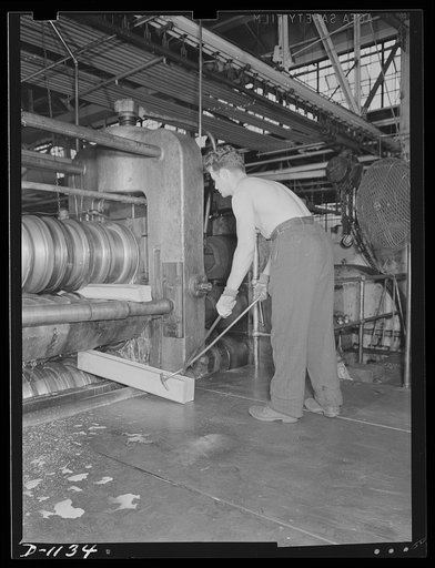 Aluminum. Reynolds Metal Company, Louisville, Kentucky. Ingots of "strong alloy" aluminum go through a rolling mill at a temperature of 800 degrees Fahrenheit