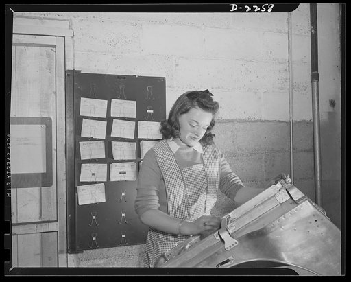 Bantam, Connecticut. Auburn-haired Jean Brunetto is polishing the aluminum of a bomber seat soon to be sent upstairs and mounted for shipment. A graduate of Litchfield High School, Class of 1938, Jean helps out on busy evenings and on weekends at her father's grill, half a mile from the plant. She h