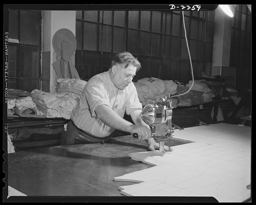 Bantam, Connecticut. Arthur Metz was a cutter in a large Bridgeport upholstery shop before coming to the Warren McArthur plant, in April 1941. He's a native of St. Louis, Missouri, having come east in 1929. An expert with the electric knife, Metz daily drives the thirty-five miles between the plant 