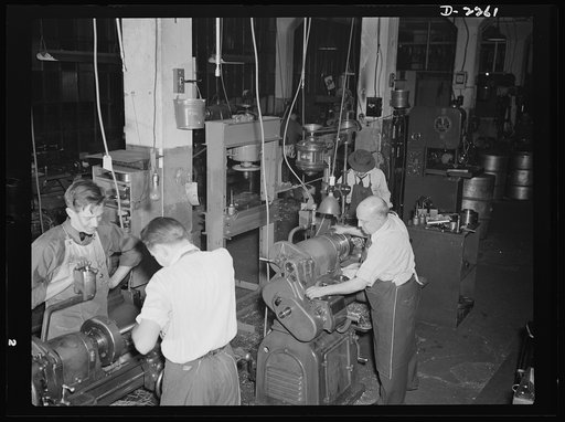 Bantam, Connecticut. One of the busiest sections of the Warren McArthur plant is the toolroom, with lathes turning for sixteen, and sometimes twenty-four hours daily. At the extreme left is Creighton Blanchard, who learned to operate a lathe at trade school in his hometown of Rutland, Vermont. Blanc