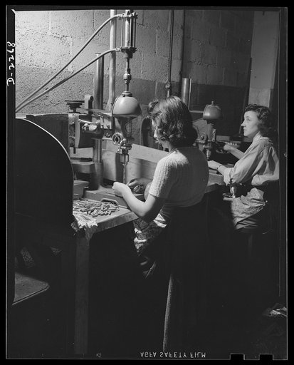 Bantam, Connecticut. These two drill press operators are natives of the section. Barbara Bongiolotti is one of the twelve Colleoni children, all natives of Bantam. Both her father and her husband work in a Torrington foundry going full blast on defense orders. Lilian Madeux is a Torrington girl who 