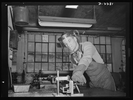 Bantam, Connecticut. Sheet metal foreman at the Warren McArthur plant is John Scott, who formerly worked in Bridgeport at United Aircraft's Sikorsky plant. The Scotts are one of the four honeymoon couples in the new defense homes project a few minutes' walk from the factory. He kept company with the