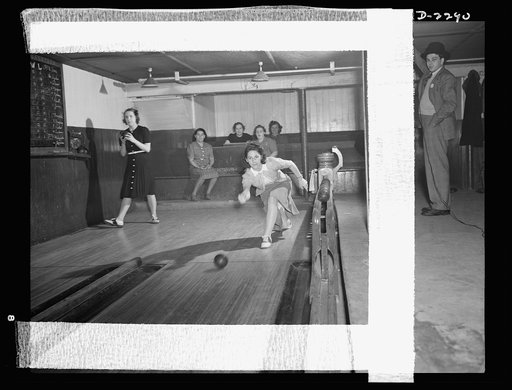 Bantam, Connecticut. In the basement of the town firehouse is the bowling alley, revenue from which helps to support the town's volunteer fire companies. Each night is alloted to a specific group, and there are several hot rivalries. Among the women shown here is Mrs. Winfield Peterson whose husband