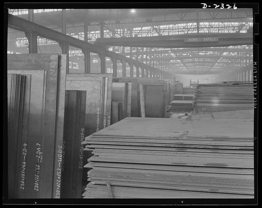 Shipbuilding. "Liberty" ships. These stacks of steel plate are in readiness for an uninterrupted flow toward the production line of a large Eastern plant fabricating sections for ships built at a nearby yard. This plant was formerly used for Pullman car construction. Bethlehem-Fairfield Shipyards In