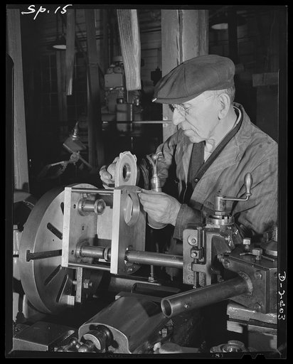 Conversion. Merry-go-round plant. These hands used to turn out merry-go-rounds to gladden the hearts of the nation's children. The carrousel plant in which they work is now engaged in producing war parts on subcontracts from army and navy contractors. These skilled hands belong to sixty-five-year-ol