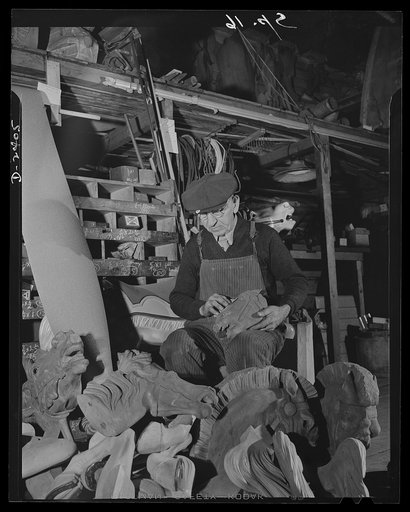 Conversion. Merry-go-round plant. The woodcarving skill of those capable hands has delighted thousands of children riding the horses of merry-go-rounds. Their skill has now been diverted for the duration to lathe work on landing gear housings for the deadly Airacobra. Spillman Engineering Company, N
