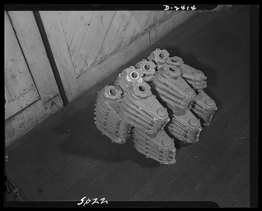 Conversion. Merry-go-round plant. These are landing gear housings for war planes. They are turned out by a New York state plant which formerly made merry-go-rounds and now makes numerous bits and pieces for the war program. Spillman Engineering Company, North Tonawanda, New York