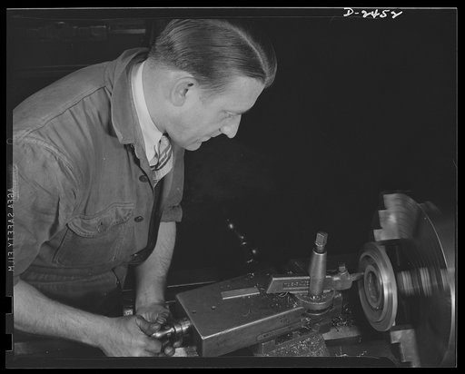 Conversion. Floor waxer plant. The sugar shortage brought this worker back to the lathe. Employed now by a small Eastern manufacturing firm which used to make floor waxers but is now completely converted to war production, this worker had only a trade school course in mechanics taken fifteen years a