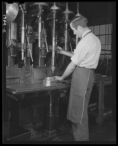 Conversion. Floor waxer plant. Normally used in manufacture of floor waxers, as shown here, this five-spindle drill press is now used full-time on defense orders for which this small Eastern plant is under subcontract. Floorola Products Inc., York, Pennsylvania