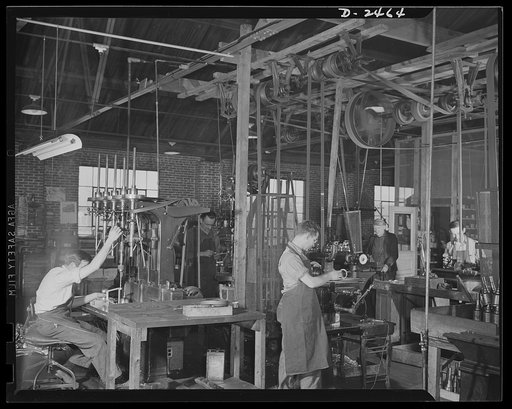 Conversion. Floor waxer plant. These twenty-year-old lathes are producing equipment for Uncle Sam's armed forces twenty-two hours a day. Alive to the possibilities of converting old equipment to defense usage, the owner of this small Eastern factory bought and remodelled old equipment which is provi