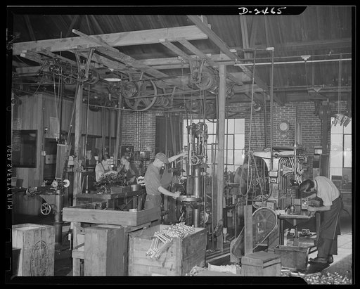 Conversion. Floor waxer plant. These twenty-year-old lathes are producing equipment for Uncle Sam's armed forces twenty-two hours a day. Alive to the possibilities of converting old equipment to defense usage, the owner of this small Eastern factory bought and remodelled old equipment which is provi