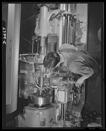 Conversion. Floor waxer plant. One of the few lathes bought by a small Eastern manufacturing firm. Unable to purchase much new machinery, the owner of the company installed and remodelled old equipment to produce war essentials under subcontract. First orders were delivered thirty days after contrac