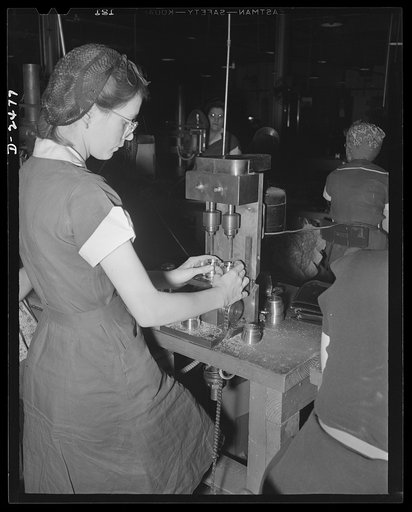 Requiring only sixty hours to build, this homemade machine enables an operator to ream simultaneously, two specially located holes in a twenty-millimeter shell booster. It would have required two months to buy a similar reaming machine on a market pressed for war orders