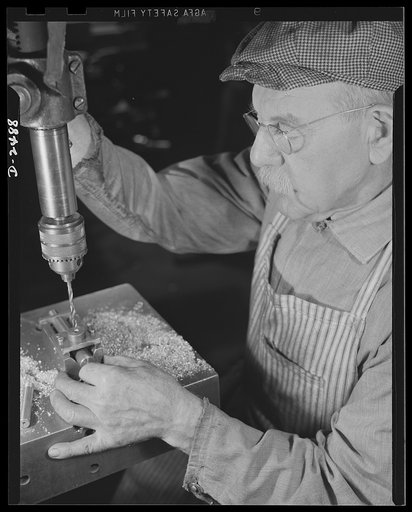 Conversion. Food machinery plant. Back to aid in his country's war effort is Phineas Davenport Allen, seventy-eight-year-old mechanic who worked on steering riggings for submarines during World War I. Today he is employed by a New England company, whose normal peacetime product is cube steak machine