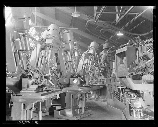 Conversion. Automobile industry. This special-purpose drilling machinery formerly used in automobile manufacture and not readily adaptable to war work, will first be stored in the back of the plant and later outdoors as the plant becomes filled with war work. Such machines are listed, however, and i