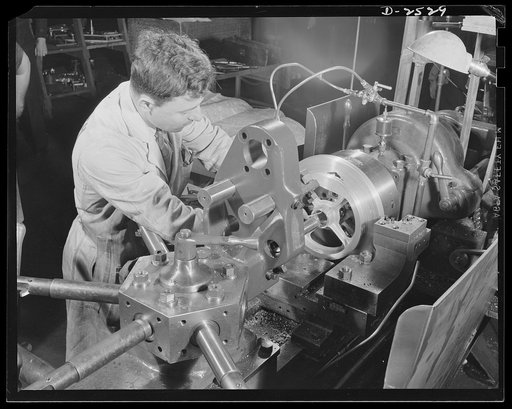 Conversion. Automobile industry. Parts of your car might once have passed through this machine, but parts for Uncle Sam's bombers are pounding through it now, as automobile factories are converted to war production. The Plymouth Company, Chrylser Corporation, Detroit, Michigan