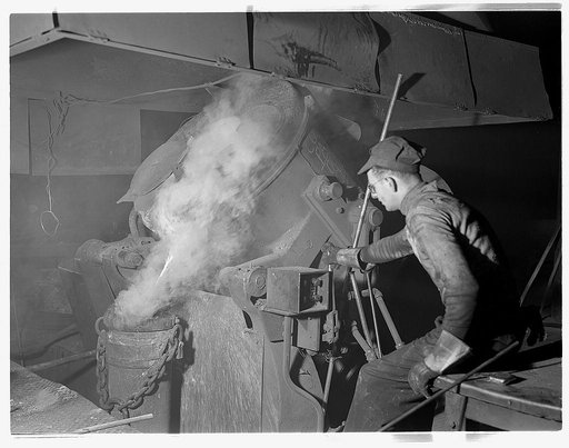 Conversion. Copper and brass processing. Casting a billet from an electric furnace. Modern electric furnaces have helped considerably in speeding the production of brass and other copper alloys for national defense. Here the molten metal is poured or cast from the tilted furnace into a cylindrical m