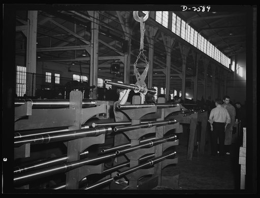 Conversion. Safe and lock company. Millimeter guns for America's armed forces are assembled in a factory once devoted to manufacture of safes and locks. York Safe and Lock Company, York, Pennsylvania