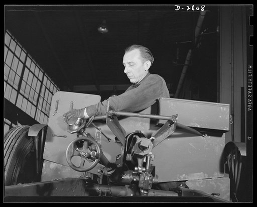Conversion. Safe and lock company. Assembling the weapons of democracy. In a factory which formerly manufactured safes and locks, today thirty-seven-millimeter guns and gun mounts are coming off the assembly line. York Safe and Lock Company, York, Pennsylvania