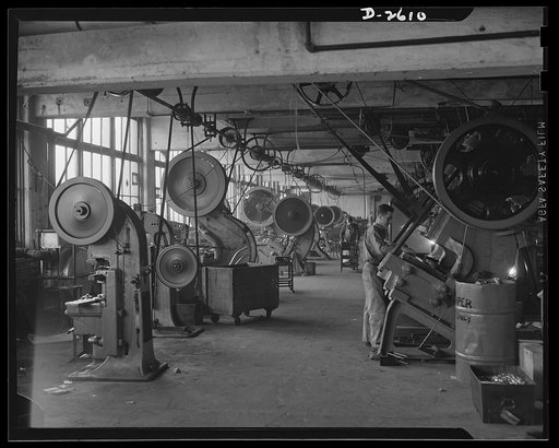 Conversion. Toy factory. Presses that once turned out metal toys and motion picture projectors are now being converted to production of filter boxes to be used in jeeps and tanks. Keystone