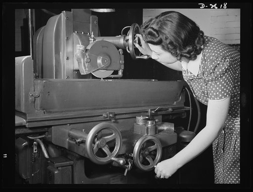 Conversion. Safety razor plant. Because of their dexterity and precision in the operation of light-duty machines, women are appearing in ever-increasing numbers on America's production lines. Here Estelle Wilson resharpens grinding wheel with a diamond point, first step toward converting one of a ra