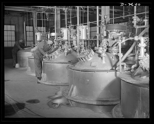 Synthetic rubber (Ameripol). These are polymerizer tanks, which covert the raw materials of synthetic rubber into latex. Each of these tanks, at the B.F. Goodrich plant in Akron, Ohio, has a capacity of about one ton of latex daily
