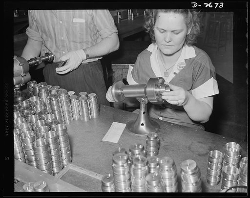 To save time in checking threads on a twenty-millimeter shell booster, a plant superintendent built this machine. It makes possible a speedy checking of thread accuracy in contrast to the old hand method. The inventor made the machine out of a fan base and a couple pieces of machine steel in a matte