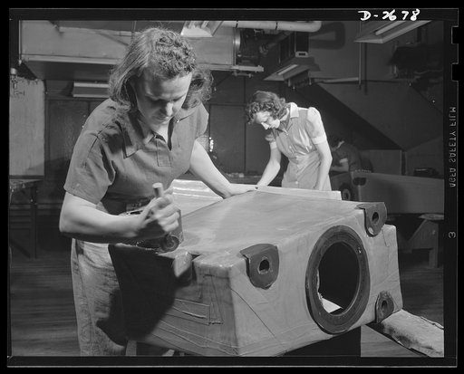 Self-sealing fuel tanks. Not only as nurses behind the battle lines, but as workers in the factory producing important war goods, women are doing much to win this war and to spare the lives of the men doing the actual fighting. These women are working on building forms used in the manufacture of sel