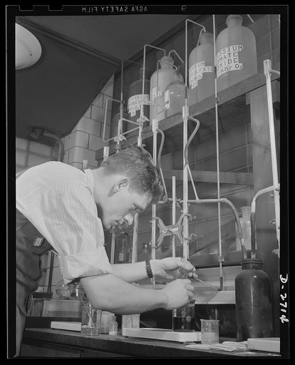 Fiberglass manufacture, Owens-Corning, Toledo, Ohio. Research workers in laboratories of the Owens-Corning Fiberglass Corporation are helping manufacturers answer war demands through product engineering of basic fiberglass materials to meet war requirements. A constant research program embracing hun