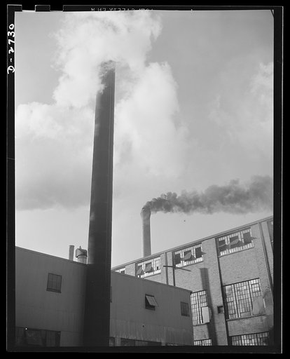 Fiberglass manufacture, Owens-Corning, Toledo, Ohio. Skyline shot showing two buildings of an Owens-Corning fiberglass plant which is all-out for war production