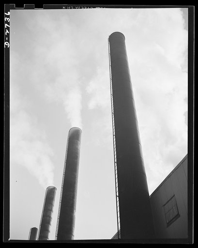 Fiberglass manufacture, Owens-Corning, Toledo, Ohio. Busy stacks give evidence of all-out war production effort at a plant of Owens-Corning Fiberglass Corporation