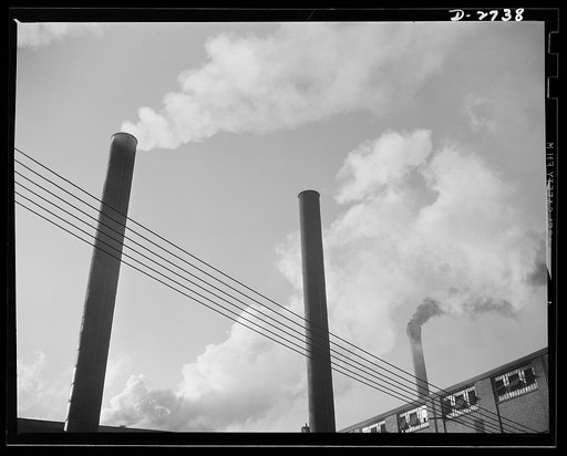 Fiberglass manufacture, Owens-Corning, Toledo, Ohio. Busy stacks give evidence of all-out war production effort at a plant of Owens-Corning Fiberglass Corporation