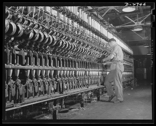Fiberglass manufacture, Owens-Corning, Toledo, Ohio. Fiberglass yarns are twisted and plied on standard textile machinery as a step in the manufacture of tapes and cloths. These yarns are used principally to insulate electrical equipment operating under heavy loads