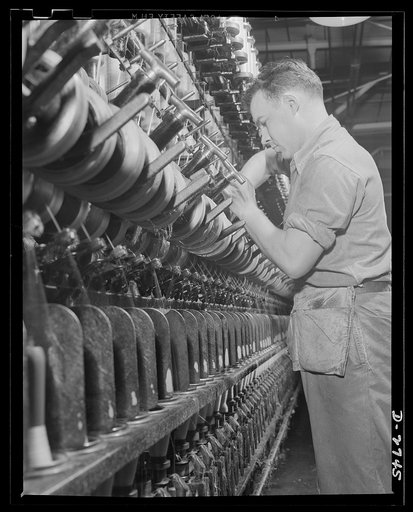 Fiberglass manufacture, Owens-Corning, Toledo, Ohio. Fiberglass yarns are twisted and plied on standard textile machinery as a step in the manufacture of tapes and cloths. These yarns are used principally to insulate electrical equipment operating under heavy loads