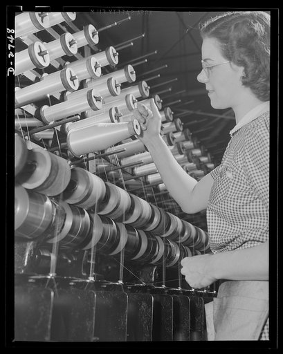 Fiberglass manufacture, Owens-Corning, Toledo, Ohio. Fiberglass yarns are twisted and plied on standard textile machinery as a step in the manufacture of tapes and cloths. These yarns are used principally to insulate electrical equipment operating under heavy loads