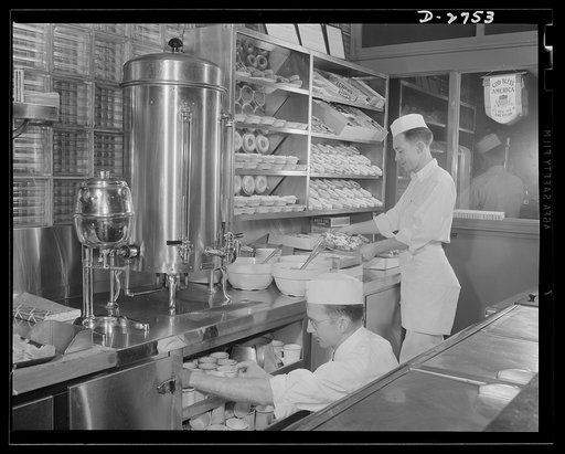 Fiberglass manufacture, Owens-Corning, Toledo, Ohio. Wholesome food is welcomed by workers in a plant of the Owens-Corning Fiberglass Corporation