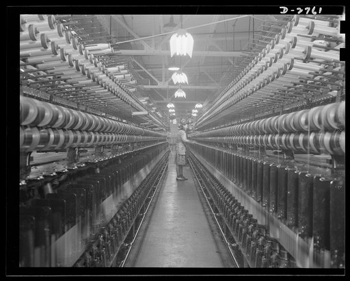Fiberglass manufacture, Owens-Corning, Toledo, Ohio. Fiberglass yarns are twisted and plied on standard textile machinery as a step in the manufacture of tapes and cloths, used principally to insulate electric equipment operating under heavier loads today than ever before